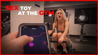 Sexy Girl Working out with Remote Control Sex Toy in Public Gym - 1 image