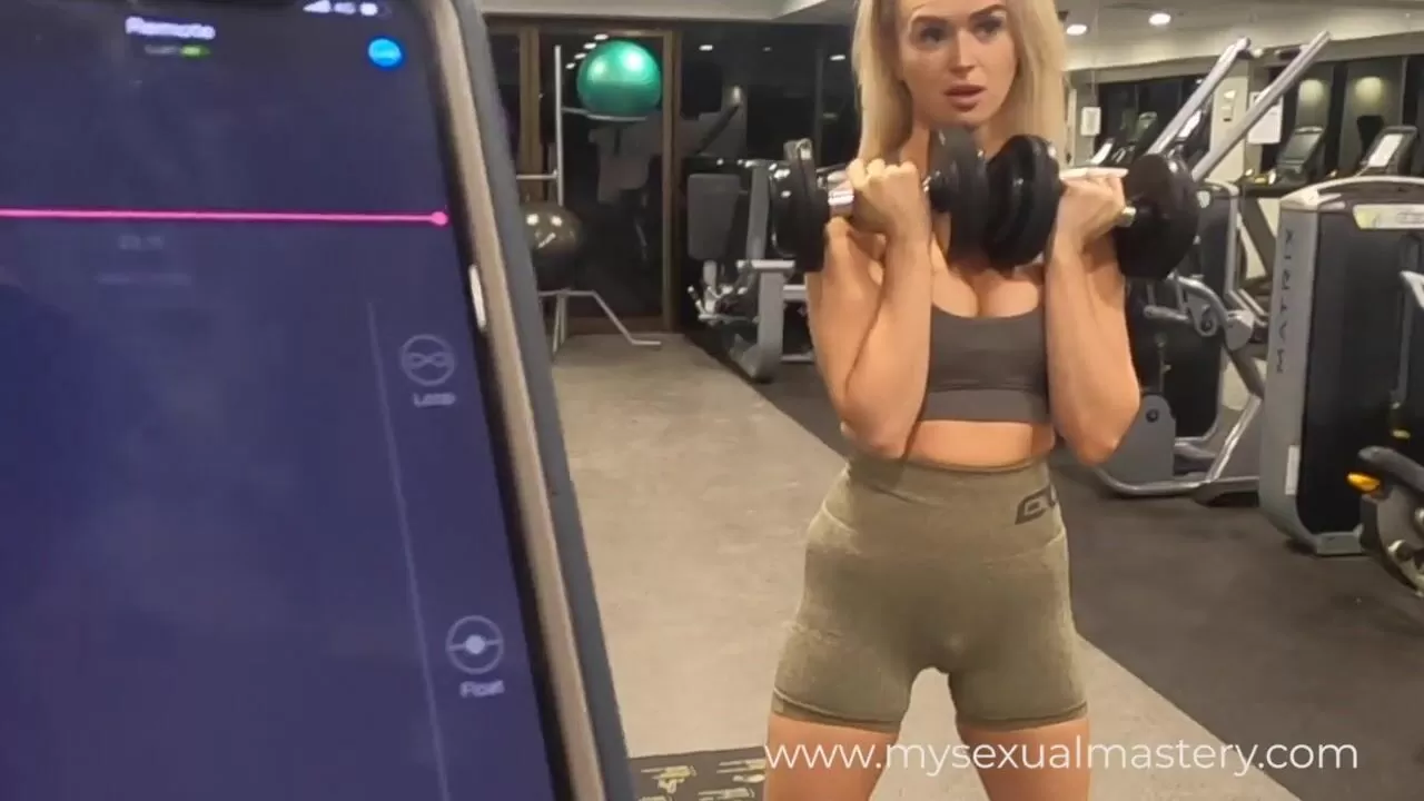 Sexy Girl Working out with Remote Control Sex Toy in Public Gym watch online