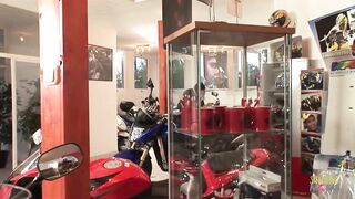 Biker milf gets a discount by sucking off the store manager in a wild orgy - 3 image