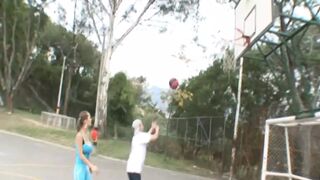 Paris Milan plays basketball outdoors - 1 image