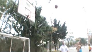 Paris Milan plays basketball outdoors - 13 image