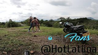 trio en publico con un motociclista en medellin colombia - 10 image