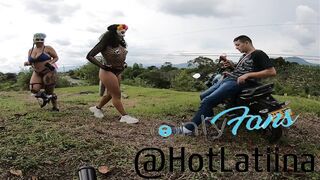 trio en publico con un motociclista en medellin colombia - 12 image