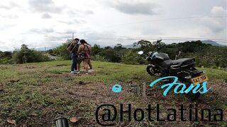 trio en publico con un motociclista en medellin colombia - 9 image