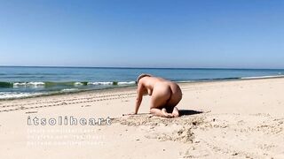 Nude public beach sunbathing with people passing by - 9 image