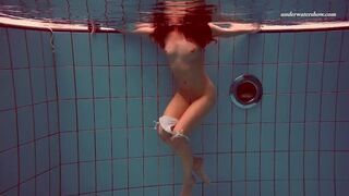 Watch Alla swim naked in the hot pool - 1 image