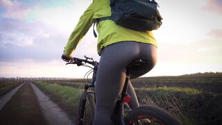 Real Amateur In Yoga Pants Riding A Bicycle View From Behind - 1 image