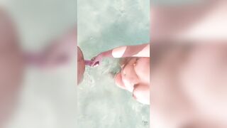 playing with stepdad's cock in the water while mom is sunbathing - 2 image