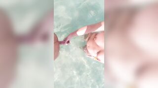 playing with stepdad's cock in the water while mom is sunbathing - 3 image