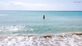 she walks naked on a public beach while her stepfather records a video. - 5 image