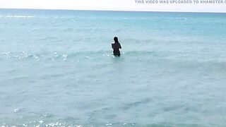 she walks naked on a public beach while her stepfather records a video. - 7 image