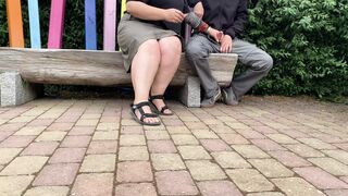 Mother-in-law jerks son-in-law's cock in a public park - 1 image