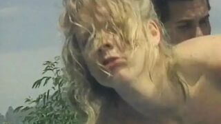 Blonde sweetie poolside gets her cunt licked and fucked by a stud - 1 image