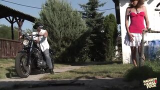 Biker stud spots a farm girl with her small tits out and stops for sex - 1 image
