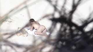 Tom films the brunette slut on the beach - 4 image