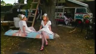 Three lesbian nurses eat pussy outdoors - 1 image