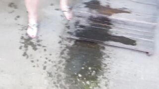 Mature pussy pissed near someone else's fence outdoors. Curvy MILF left a puddle of urine in a public place. Amateur fetish. ASMR. - 14 image
