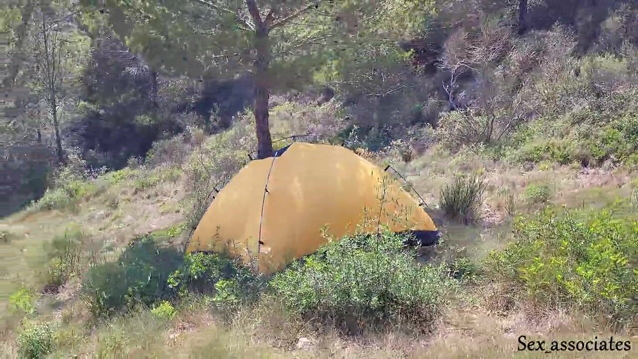 The tourist heard loud moaning and caught couple fucking in the tent image photo