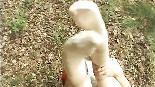Slim German babe fingering her moist twat in the woods - 12 image