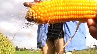 Stunning German lady stuffing a corn in her moist holes - 1 image