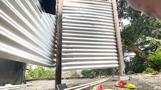 Katrina recording herself in the outdoor dressing room