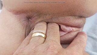 Close up outdoor pussy play and insertion of sunscreen bottle