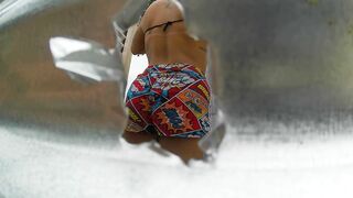 Woman recorded in outdoor booth (LATINA IN PUBLIC) - 12 image