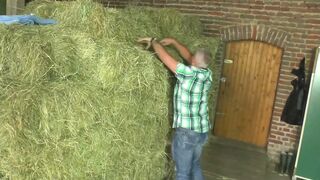 Older couple takes break from working at field - 1 image
