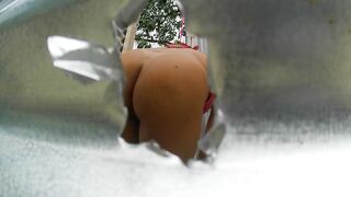 Woman recorded in outdoor booth (IN PUBLIC) - 10 image