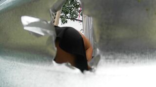 Woman recorded in outdoor booth (IN PUBLIC) - 15 image