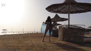 I go without panties on a public beach - 3 image