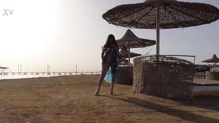 I go without panties on a public beach - 4 image