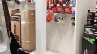 A sexy milf flash her boobs when she walk in different stores! - 13 image