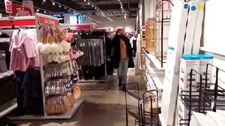 A sexy milf flash her boobs when she walk in different stores! - 3 image
