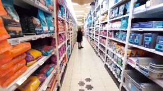 A sexy milf flash her boobs when she walk in different stores! - 5 image