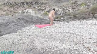 Masturbation with Stone in Ass and Pussy on Nudist Beach - 11 image
