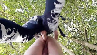 Femdom pegging. Strap-on in slave's ass outdoors in the bushes. - 2 image