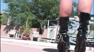 Beautiful brunette babe gets a threesome next to the outdoor pool and loves it - 1 image