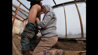 Farmer's Wife with Rubber Boots Sucks a Cock in the Greenhouse - 1 image