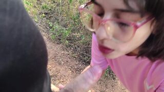 Latina teen gives a blowjob in the woods - 1 image