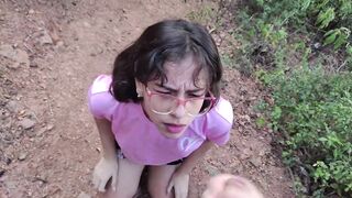 Latina teen gives a blowjob in the woods