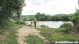 Teen joins in oldies trio in outdoor sex romp - 1 image