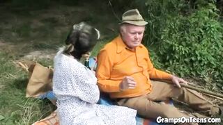 Teen joins in oldies trio in outdoor sex romp - 4 image