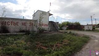 Horny student gives blowjob behind garages - 1 image