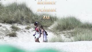 Teen lesbians on the beach - 1 image