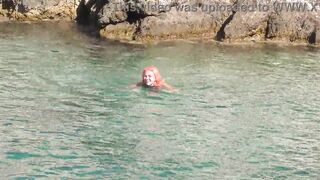 Blue water and a naked girl!