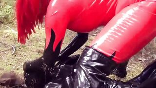 Femdom Humiliation Outdoor: Latex Mistress and Rubber Submissive - 1 image