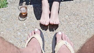 Showing our bare feet and painted toes