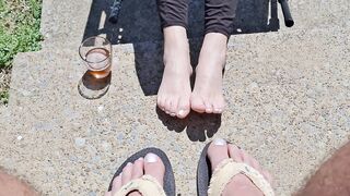 Showing our bare feet and painted toes