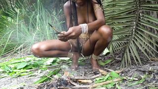 Hot African native woman cooking in the jungle - 11 image